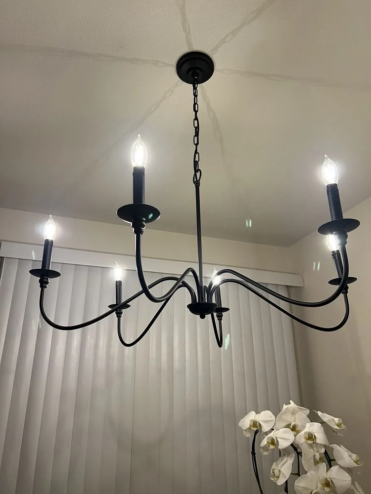 Newly wired chandelier light fixture installed by Washington Electrical