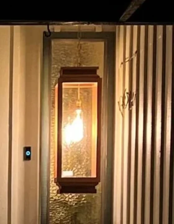 Exterior wall lantern installed beside a front door