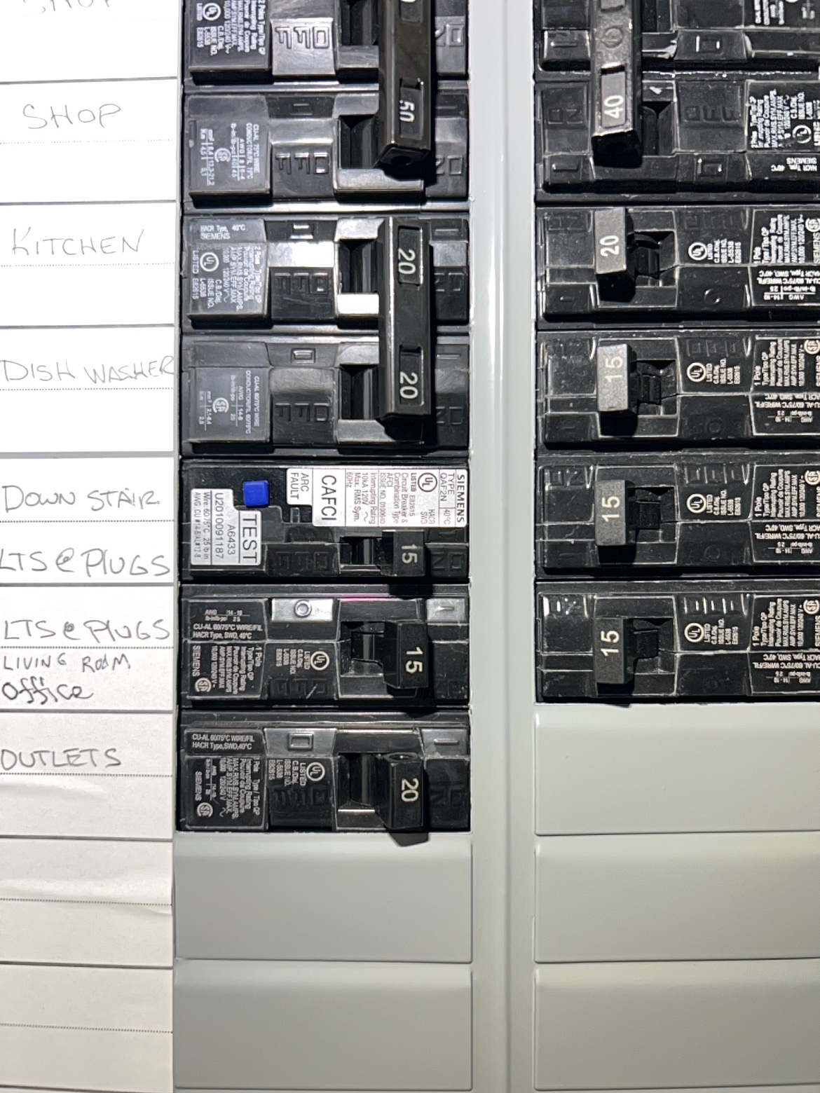 Siemens panel close-up with CAFCI breakers and labeled directory installed by Washington Electrical