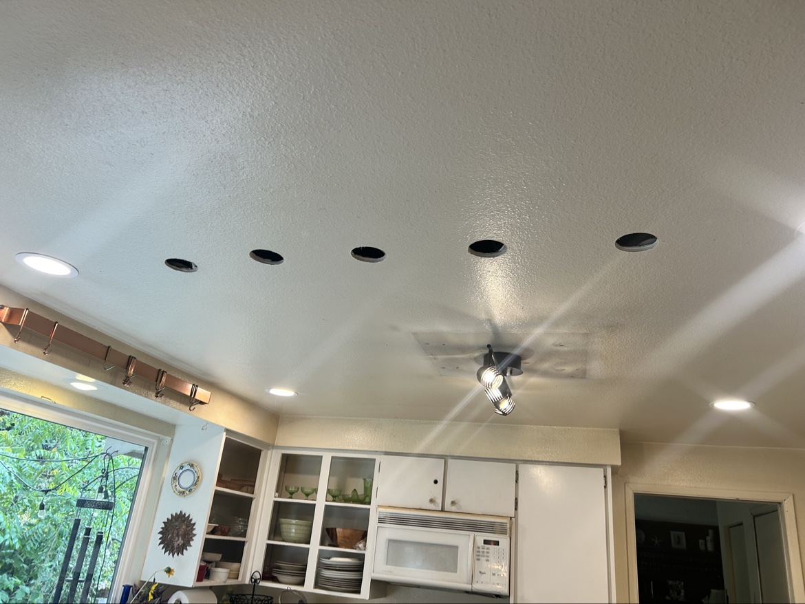 Kitchen recessed can lighting being installed by Washington Electrical